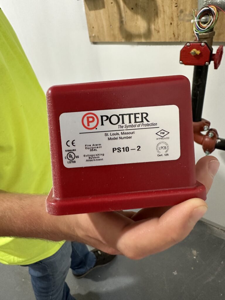 person holding red potter control